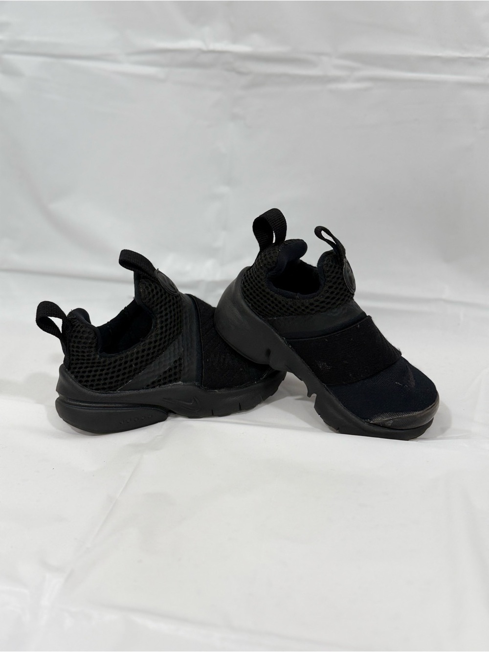 Nike Kids All-Black Slip-On Sneakers
